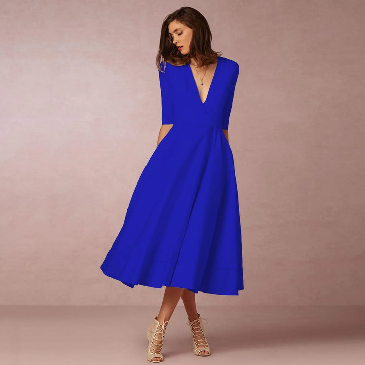 Fashionable women's elegant V-neck elbow-sleeve midi dress, perfect for refined style.