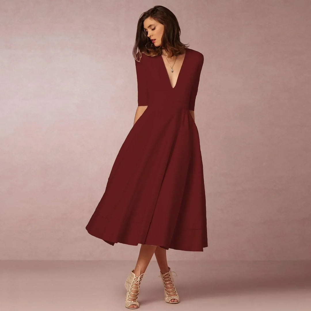 Flattering women's V-neck midi dress with elbow sleeves, elegant and perfect for everyday fashion.