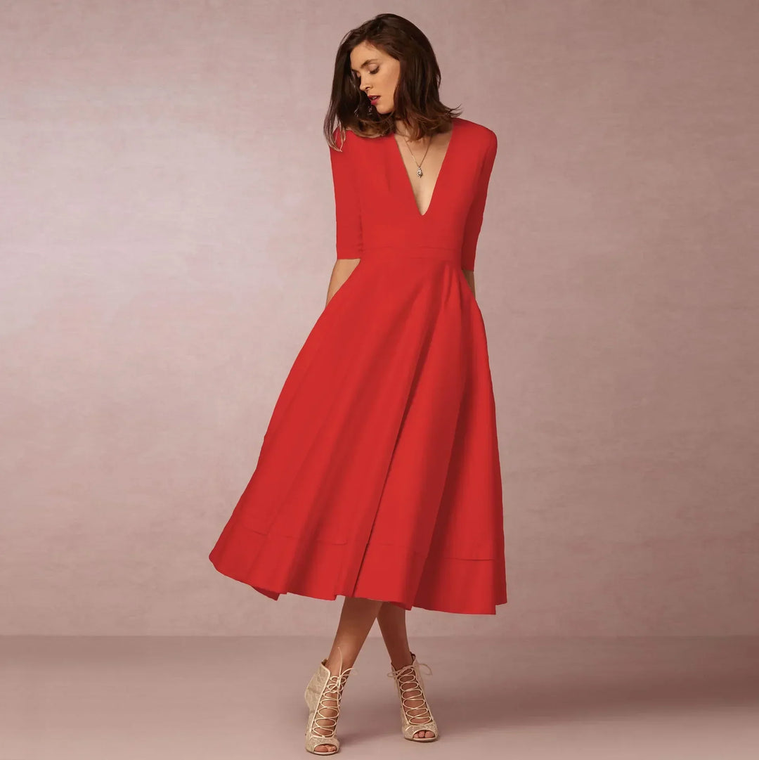 Modern women's V-neck elbow-sleeve midi dress, offering casual chic and sophisticated style.