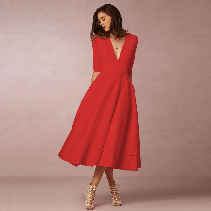 Modern women's V-neck elbow-sleeve midi dress, offering casual chic and sophisticated style.