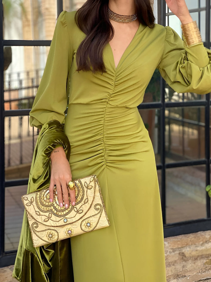 Sophisticated long sleeve V-neck maxi dress, ruched high-low hem, women's formal.
