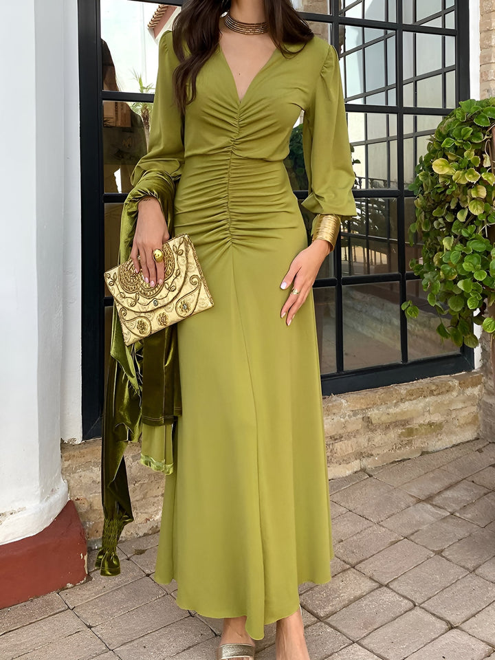 Wedding guest V-neck maxi dress, long sleeve, ruched high-low hem for women.