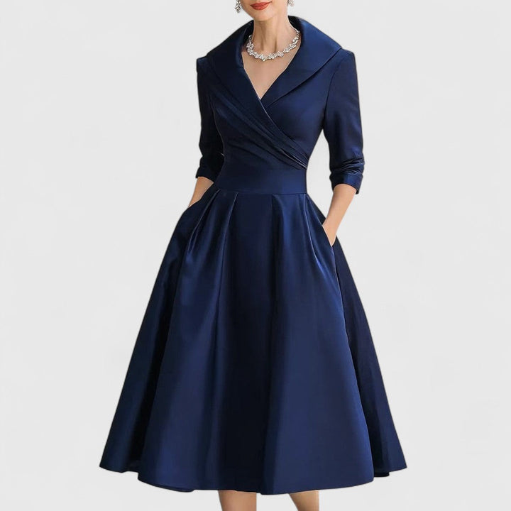 Elegant V-neck midi dress for women with flattering 3/4 sleeves, ideal for various occasions.