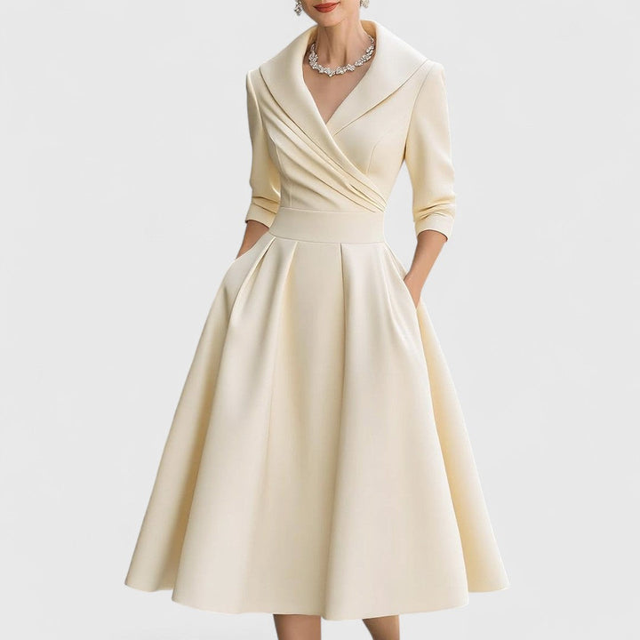 Elegant women's midi dress, V-neck, 3/4 sleeves. Perfect for office, formal events or casual outings.