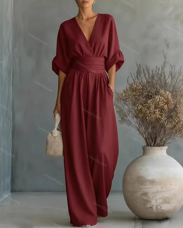Modern women's one-piece V-neck jumpsuit, combining comfort, elegance, and effortless style.