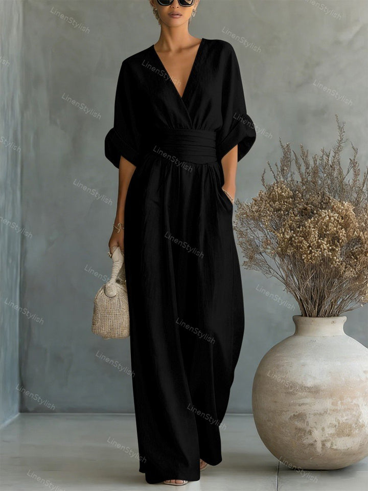 Women's formal V-neck jumpsuit in a sophisticated design, ideal for elegant fashion.