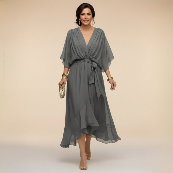 Women's elegant midi dress featuring a stylish V-neck and flattering wrap design.