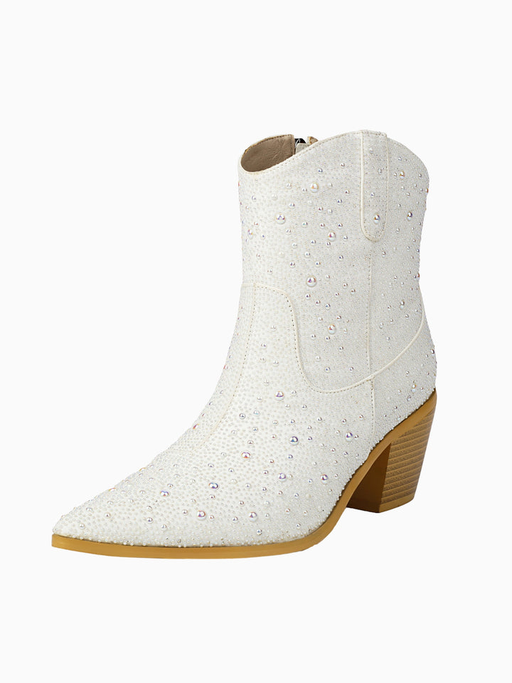 Stunning white cowgirl boots featuring intricate pearl rhinestone details, ideal women's formal wedding shoes.