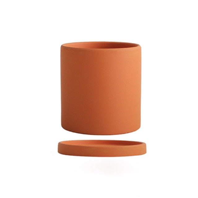 Durable ceramic indoor planter with saucer, ideal for all plant lovers.