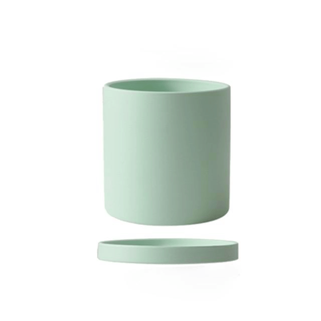 Vibrant blue ceramic flowerpot with saucer, brightens up any indoor space.