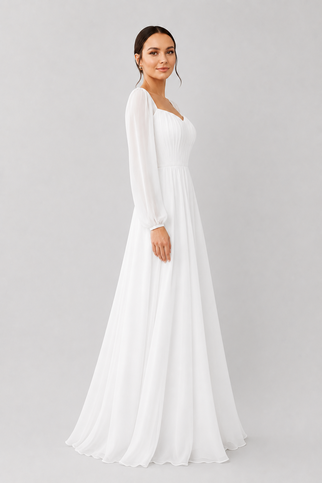 Formal white elegant long sleeve maxi dress for women, with a flattering sweetheart neckline. Special occasion wear.