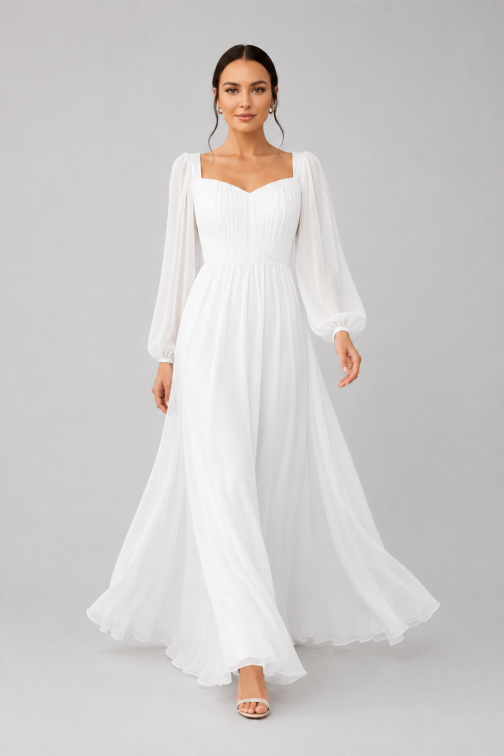 Stylish women's white maxi dress with an elegant sweetheart neckline & long sleeves. Ideal for formal events.