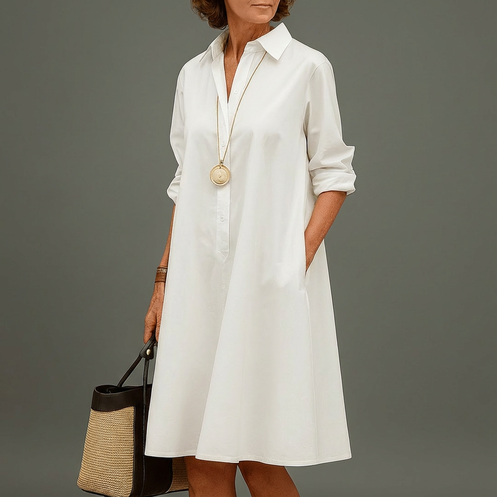 Elegant white midi shirt dress for women, featuring a button-down front and A-line cut, perfect for timeless fashion.