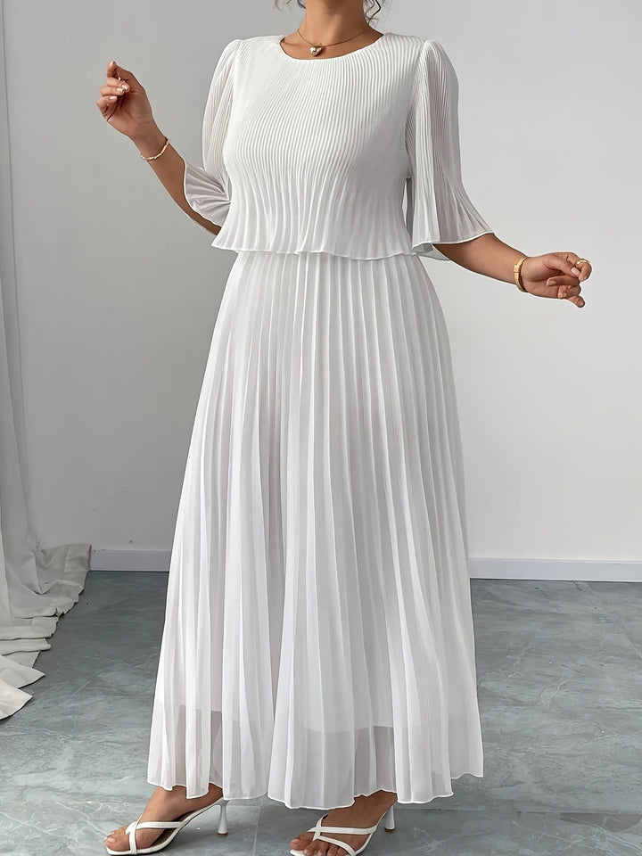 Stunning A-line white maxi dress with delicate pleats for women, a sophisticated choice for formal events.