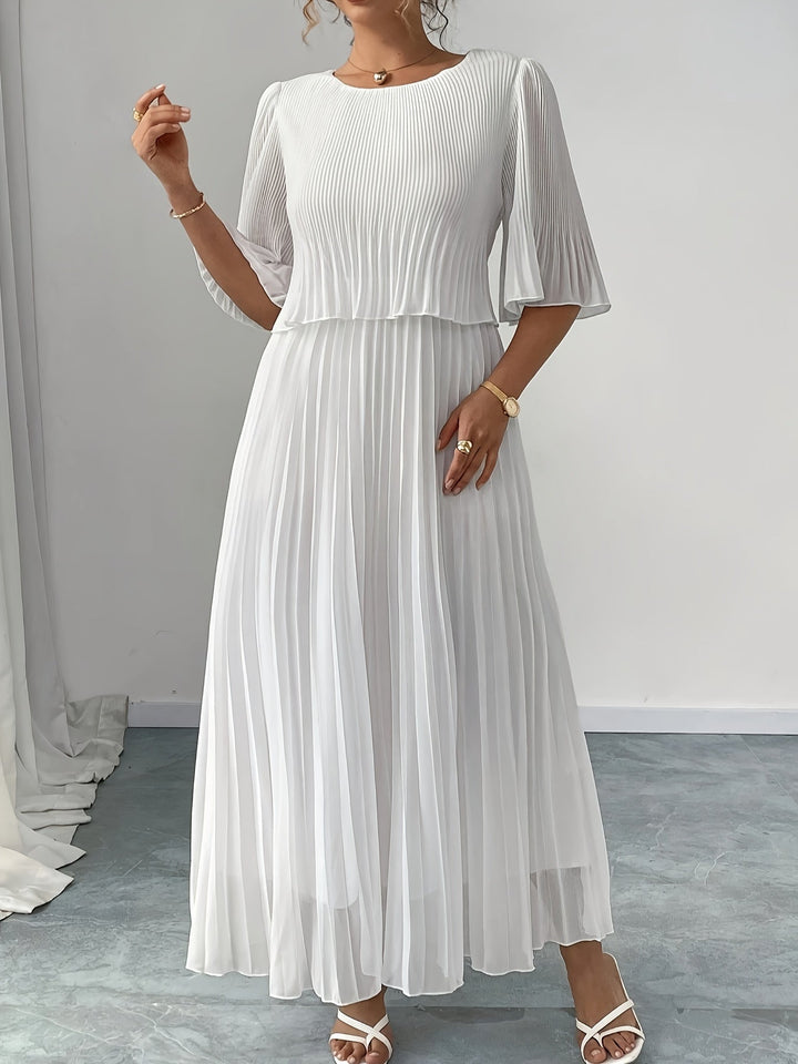 Beautiful white pleated A-line formal dress for women, an elegant maxi perfect for any wedding guest.