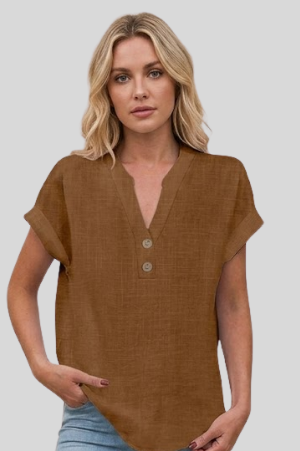 Elegant white women's V-neck short sleeve button blouse. Versatile for office work wear or chic casual fashion.