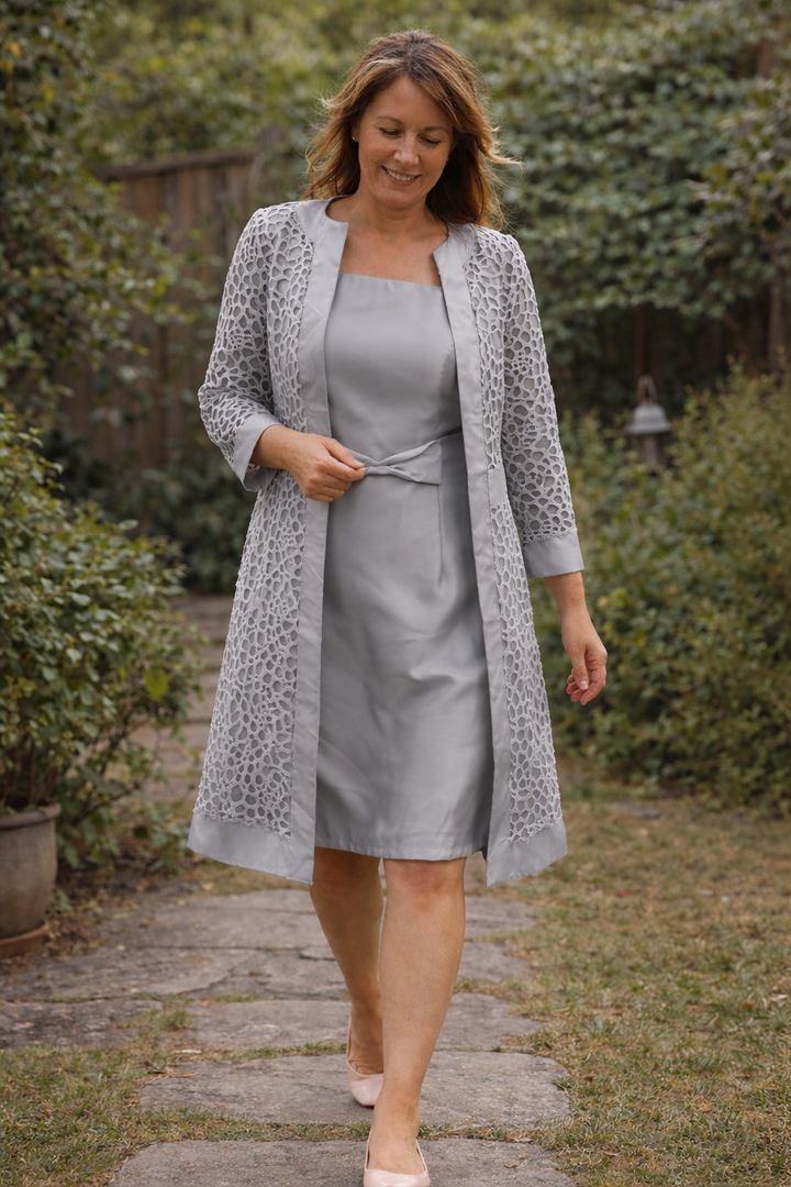 Classic women's formal dress set, featuring a midi dress & elegant jacket for special occasions.