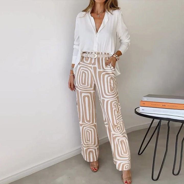 Elegant women's 2-piece set: flowing top & chic patterned trousers. Versatile fashion for modern women.