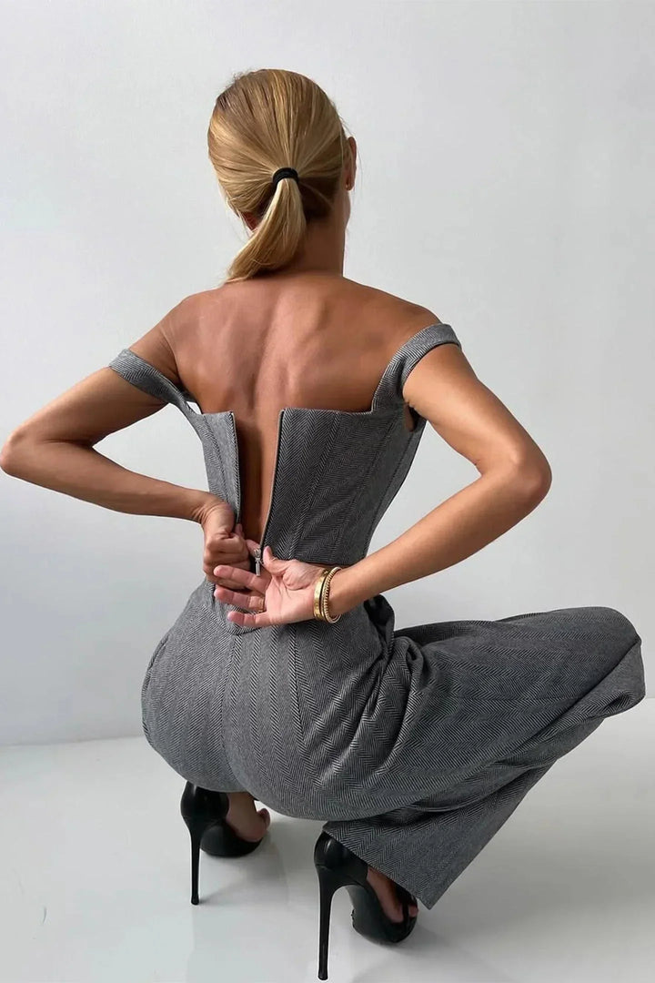 Stylish women's three-piece set featuring a corset bustier, flowy wide leg pants, and an oversized blazer.