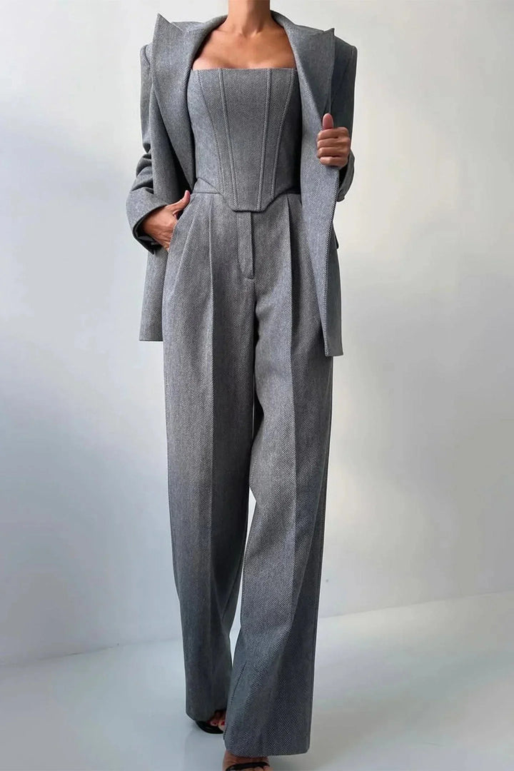 Women's elegant gray suit set: corset bustier, wide leg trousers & sophisticated oversized blazer.