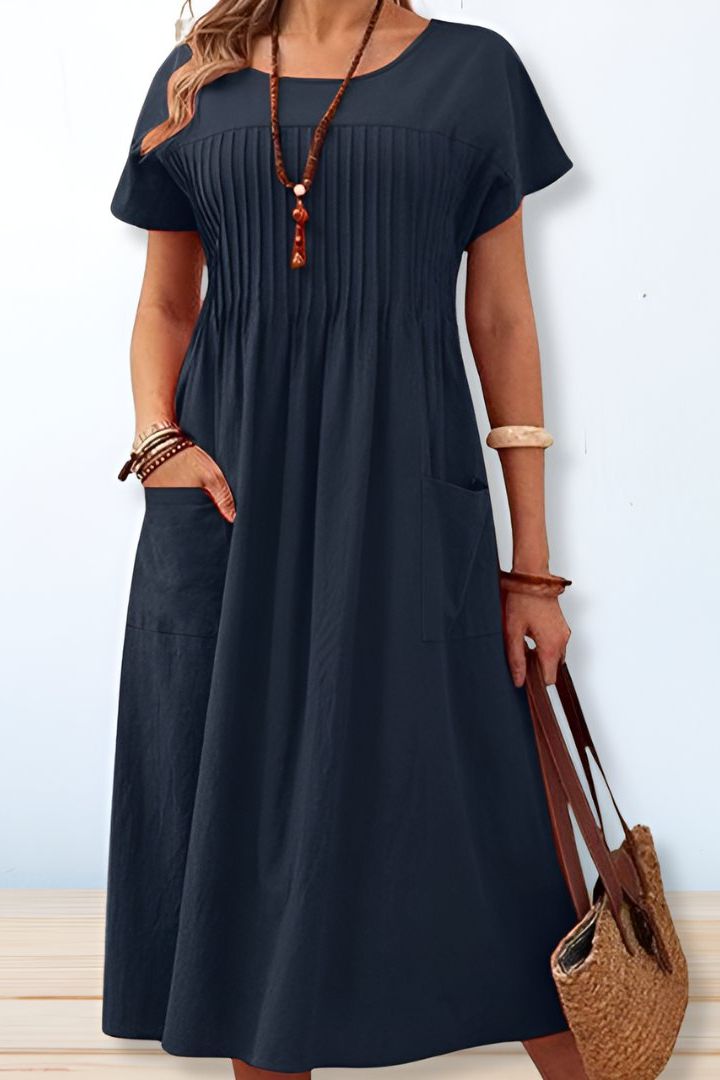 Flattering A-line midi dress for women. Elegant classic style, comfortable and versatile for everyday wear.