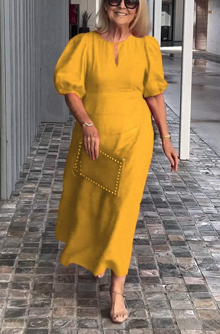 Elegant women's puff sleeve, keyhole neckline, A-line midi dress. Ideal for wedding guest, party, or cocktail.