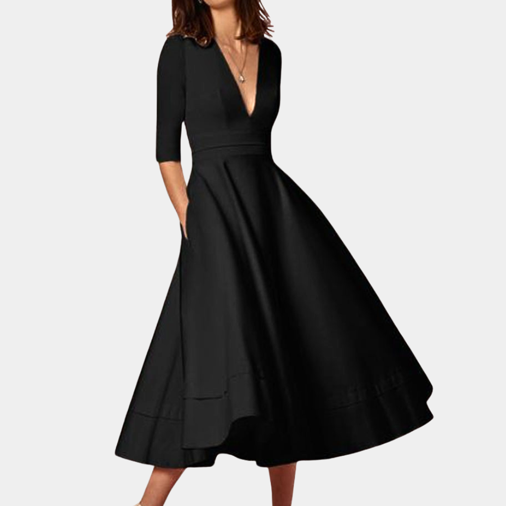 Comfortable women's sleeveless A-line midi dress, featuring a side slit. Versatile for casual or chic wear.