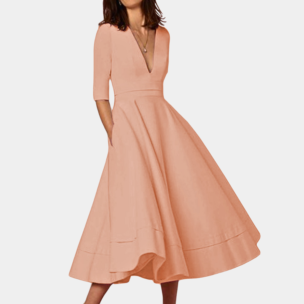 Classic women's A-line midi dress with a sleek sleeveless cut & elegant side slit detail. Effortless style.