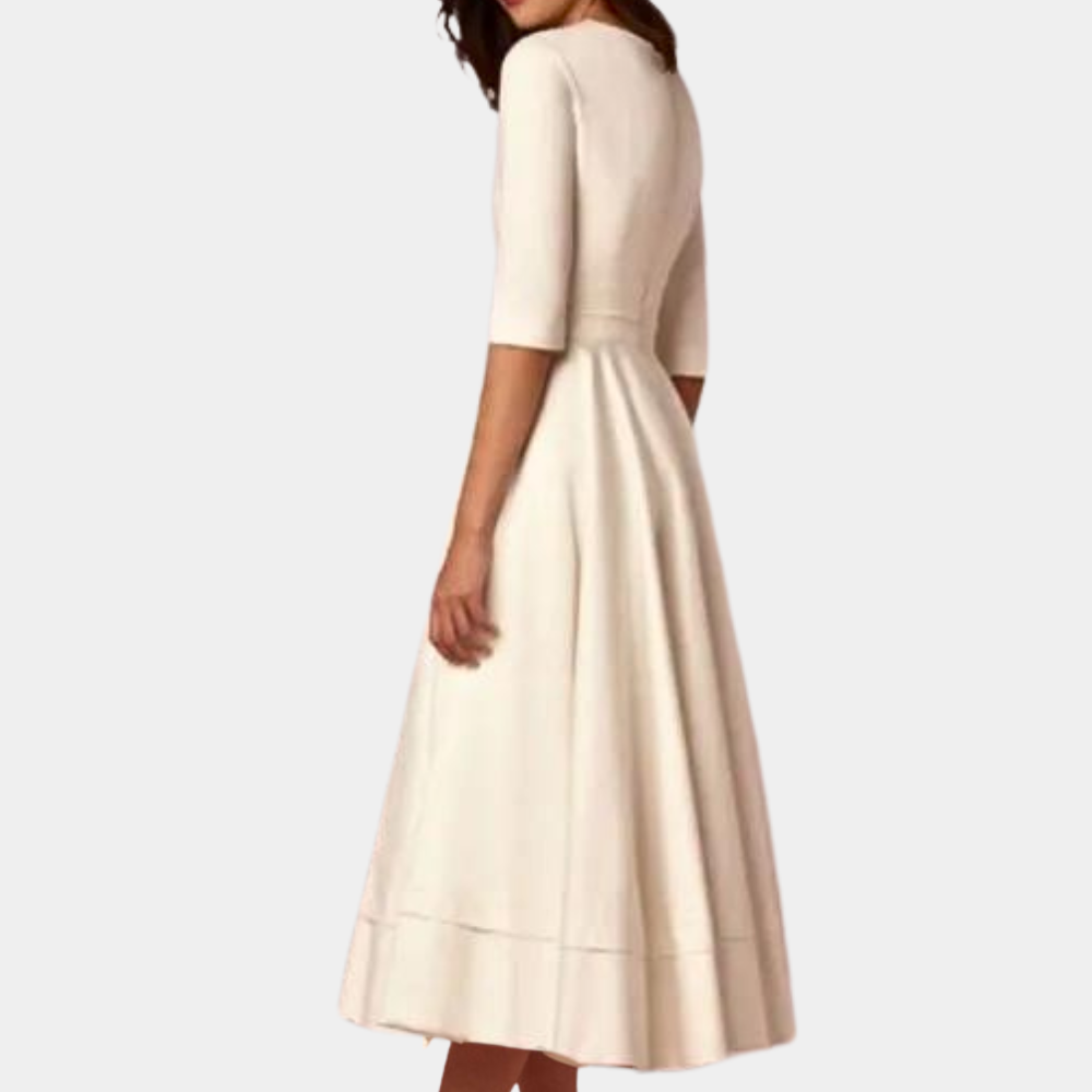 Stylish women's sleeveless A-line midi dress with a sophisticated side slit. Modern & comfortable everyday wear.
