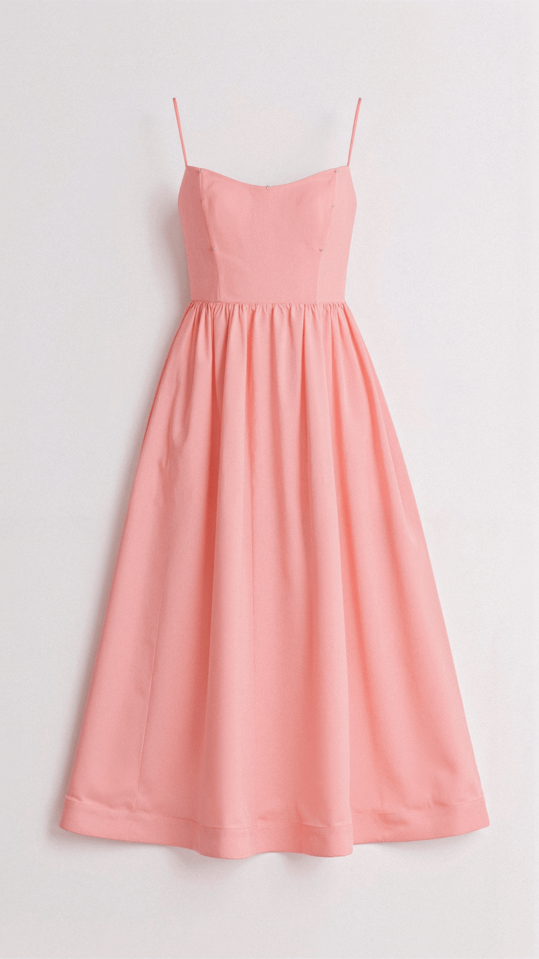 Elegant women's A-line midi dress with thin spaghetti straps, a perfect spring & summer occasion outfit.