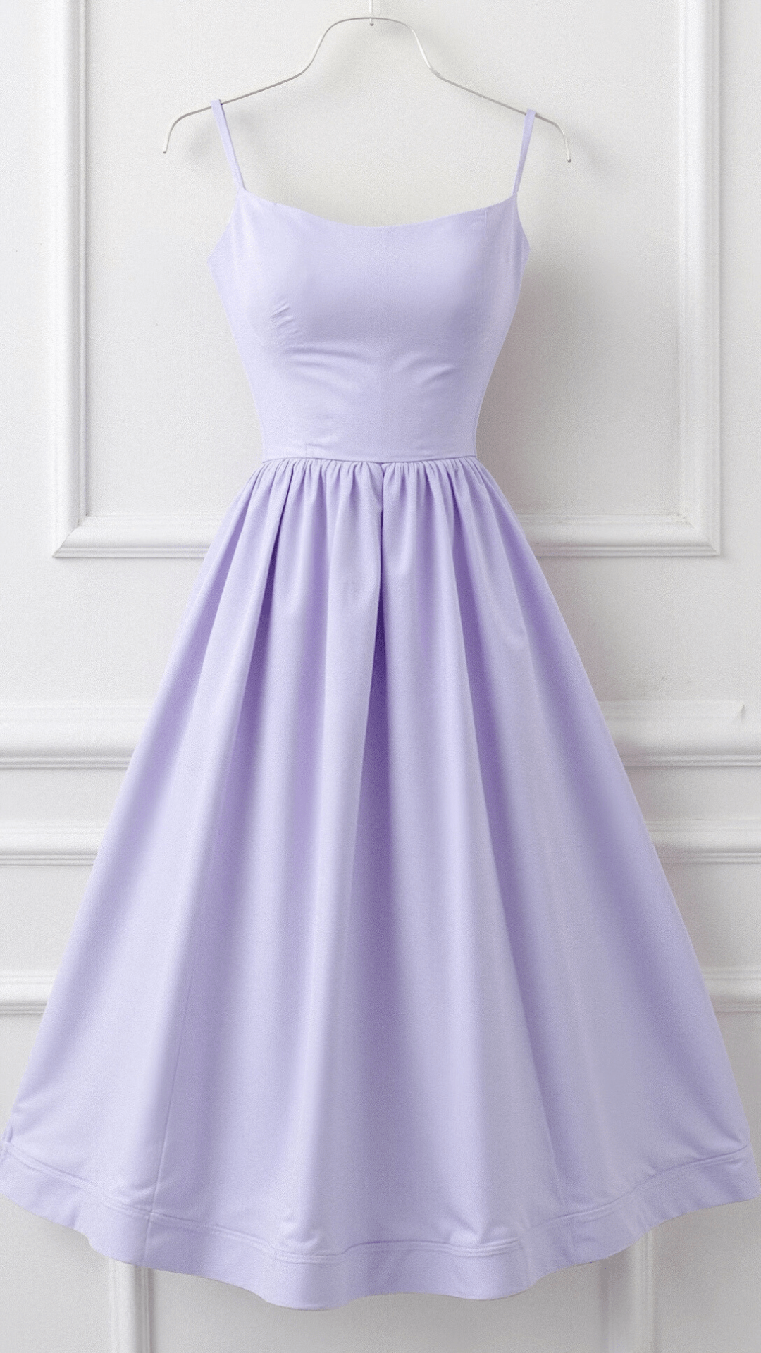 Women's elegant A-line midi dress, spaghetti straps. Ideal for summer fashion, parties, or special events.