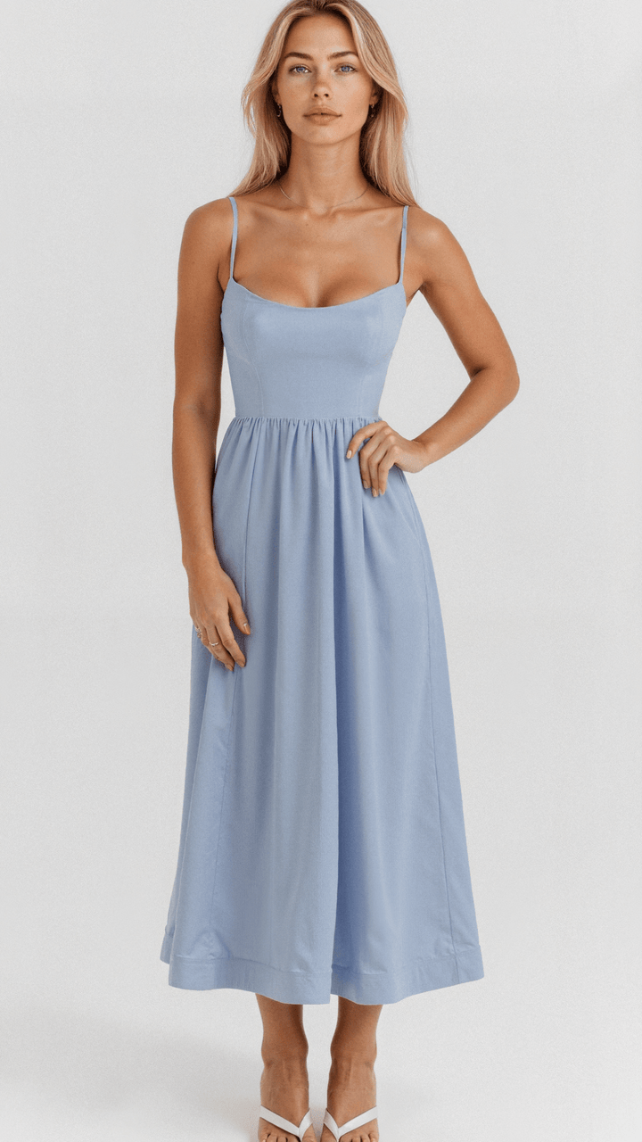 Versatile women's midi dress, A-line cut and spaghetti straps, suitable for parties or casual chic style.