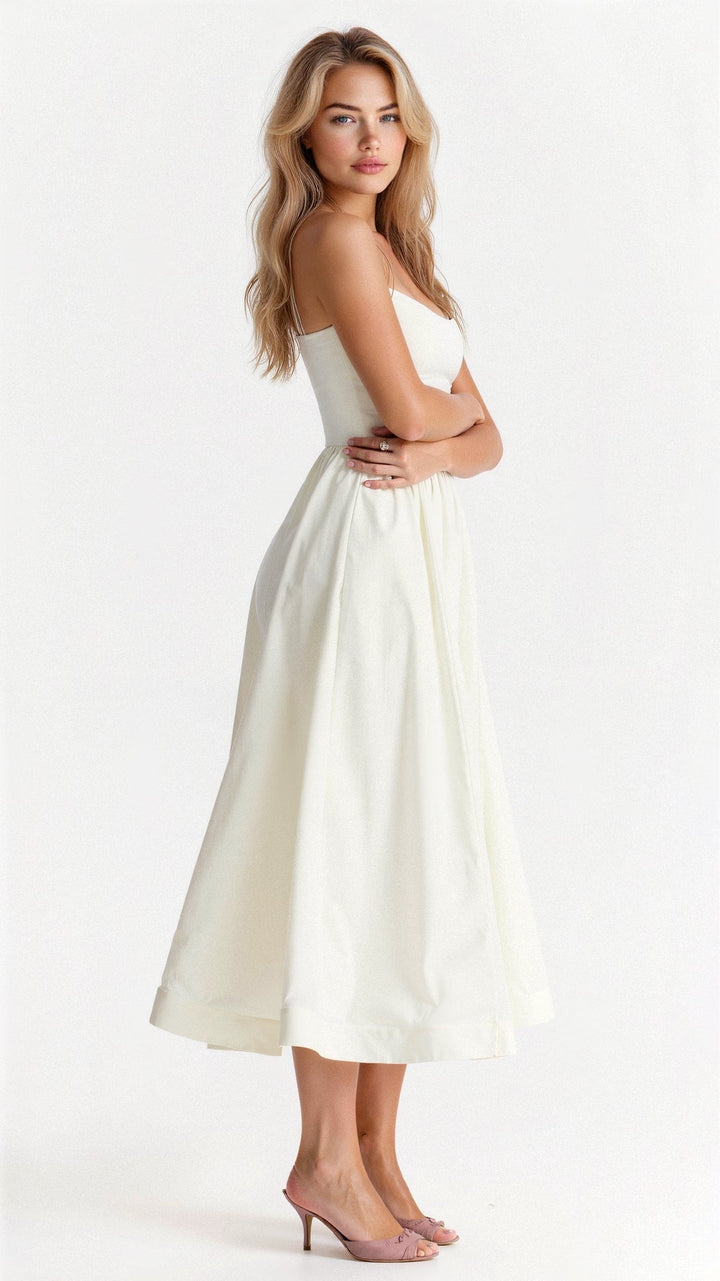 Women's elegant spaghetti strap A-line midi dress for spring and summer events. Perfect party wear.