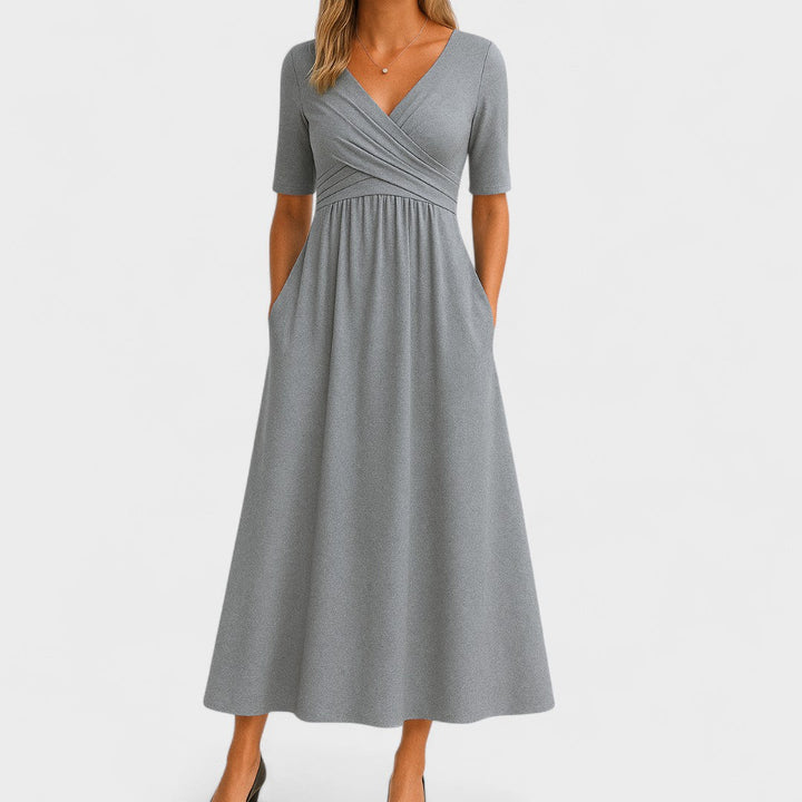 Elegant women's A-line wrap semi-formal midi dress with V-neck & 3/4 sleeves, perfect for office or cocktail.