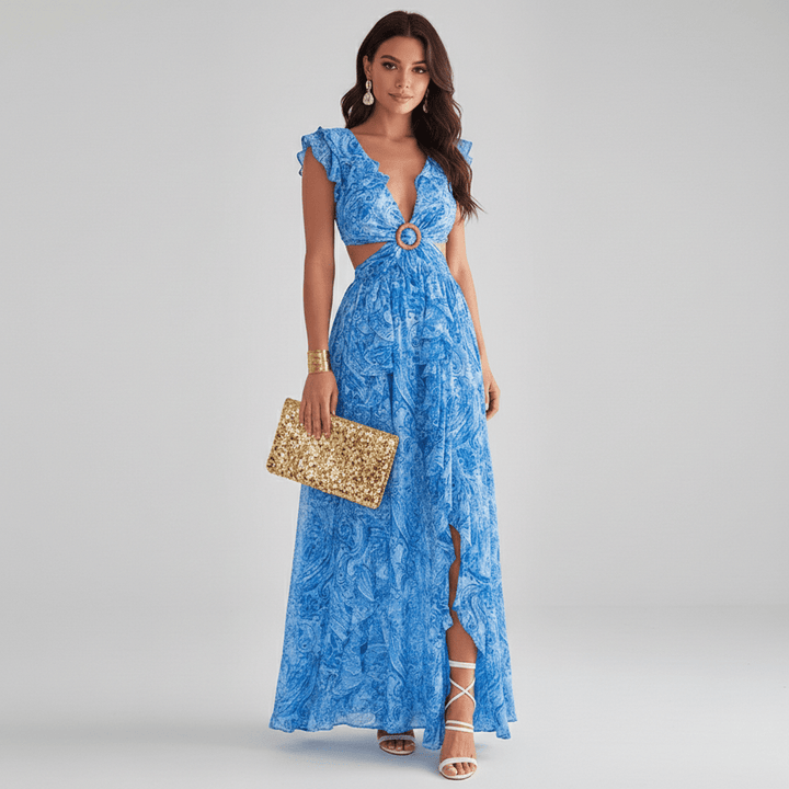 Modern women's abstract print occasion wear maxi dress with chic cut-outs and flattering ruffle sleeves.
