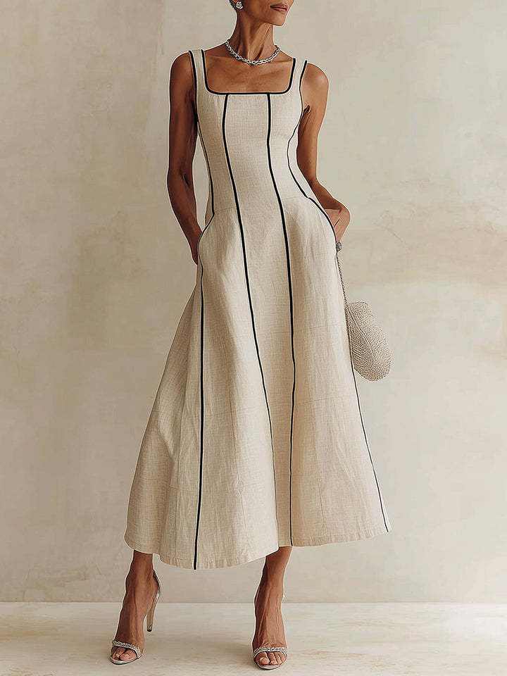 Elegant women's apricot A-line maxi dress with square neck & black contrast piping, perfect for summer parties.