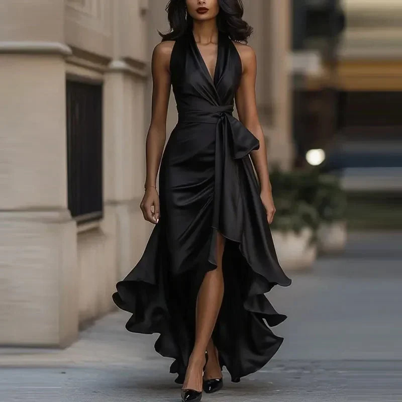 Chic women's off-shoulder pleated maxi dress with elegant asymmetrical hem, a stunning long evening gown.