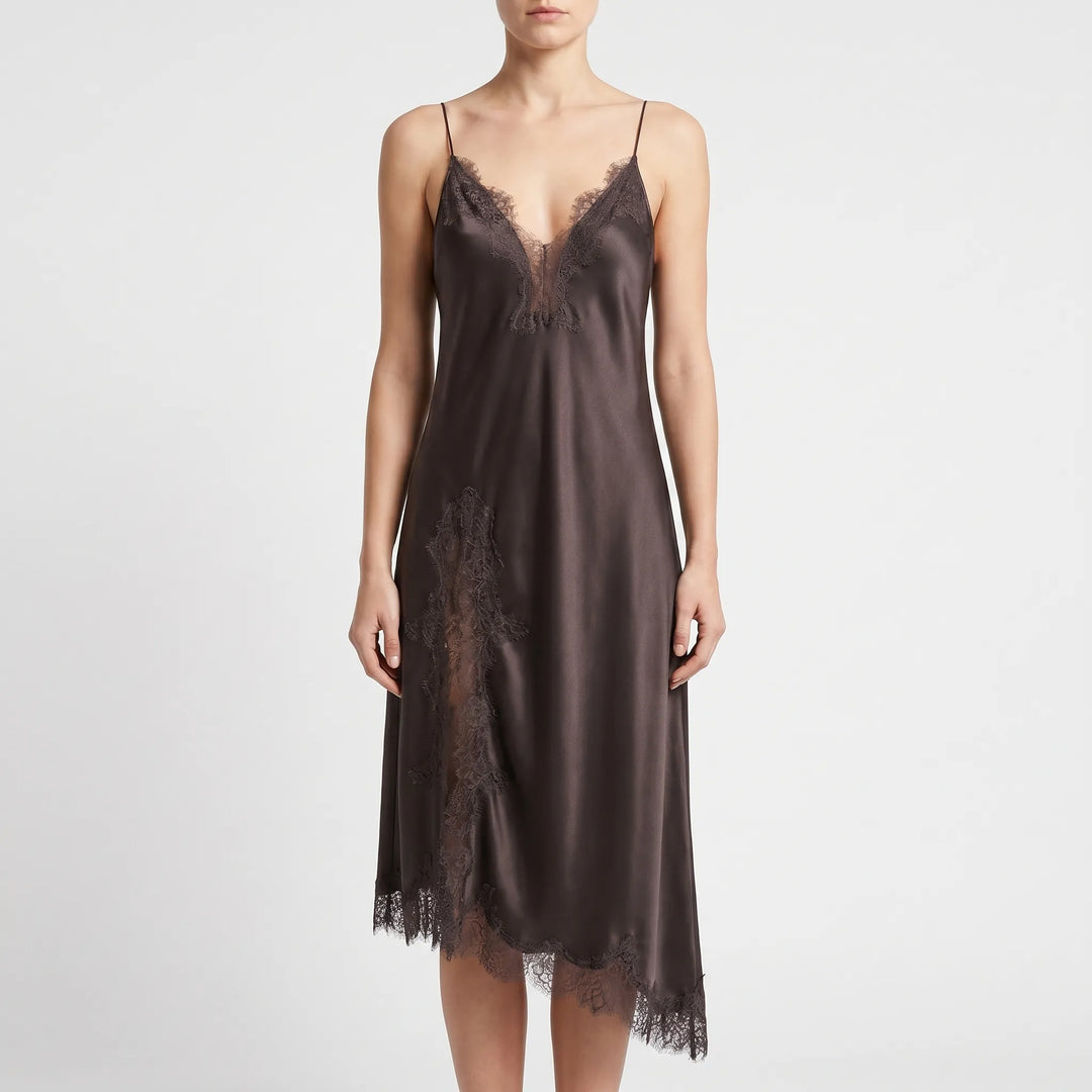Chic asymmetrical slip dress for women, featuring delicate lace detail & v-neck. Ideal elegant party or occasion wear.