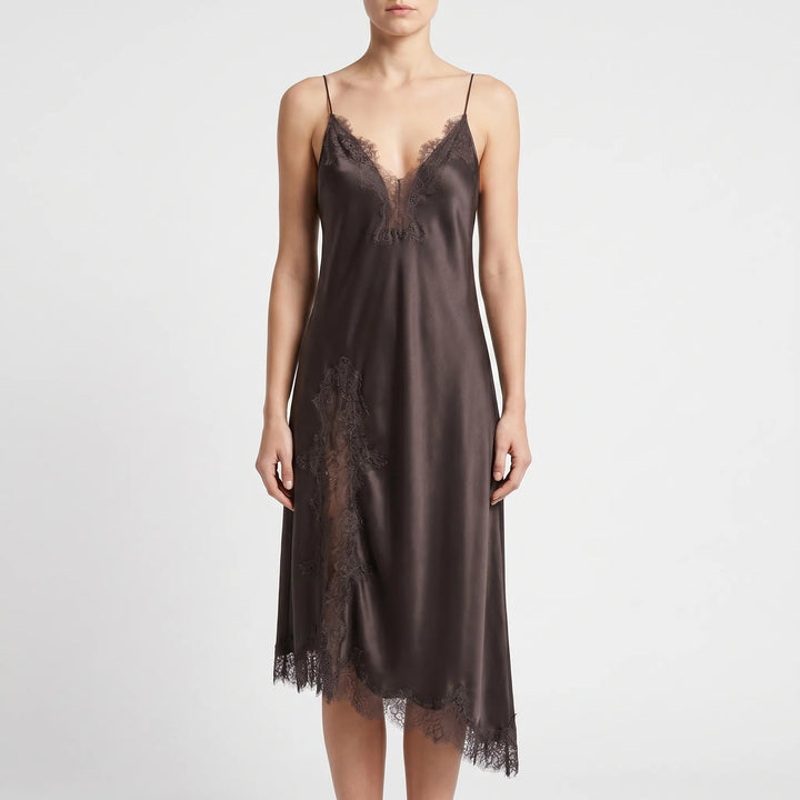Chic asymmetrical slip dress for women, featuring delicate lace detail & v-neck. Ideal elegant party or occasion wear.