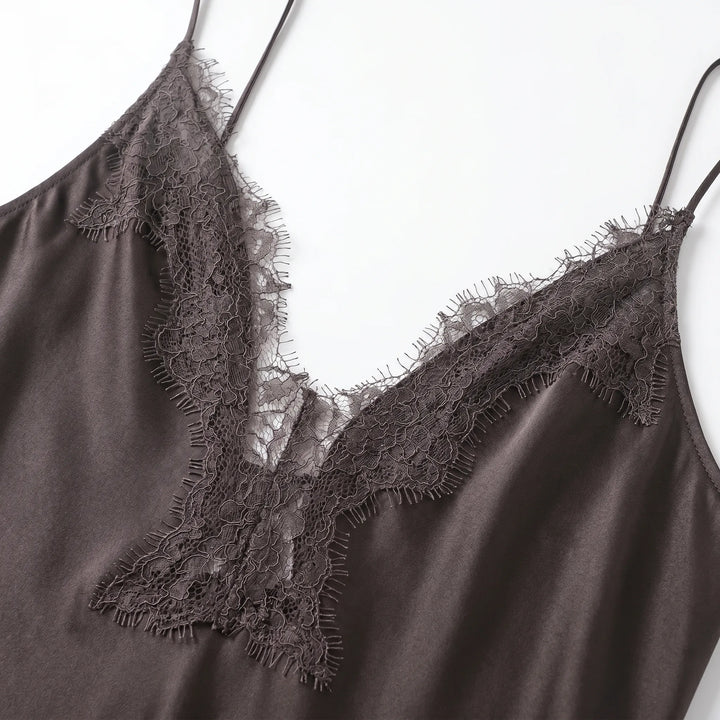 Effortless women's asymmetrical slip dress, sleeveless and v-neck. A stylish & comfortable midi for summer evenings.