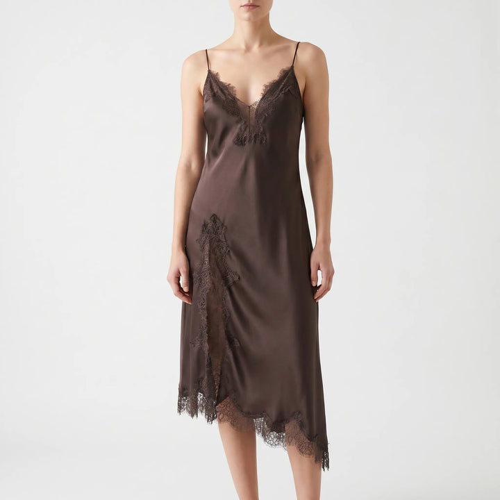 Stylish women's asymmetrical midi slip dress with a flattering v-neck, elegant lace detail, and unique hemline.