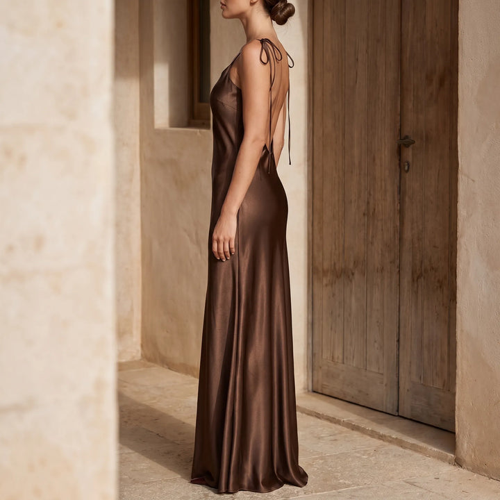 Elegant women's backless floor-length slip dress with V-neck, perfect for formal evening wear & parties.