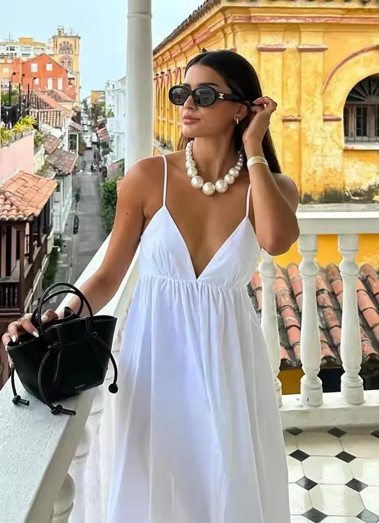 Elegant women's backless spaghetti strap V-neck maxi summer dress, perfect for beach, vacation, or casual wear.