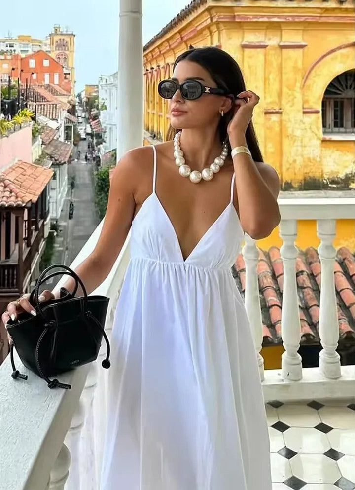 Elegant women's backless spaghetti strap V-neck maxi summer dress, perfect for beach, vacation, or casual wear.