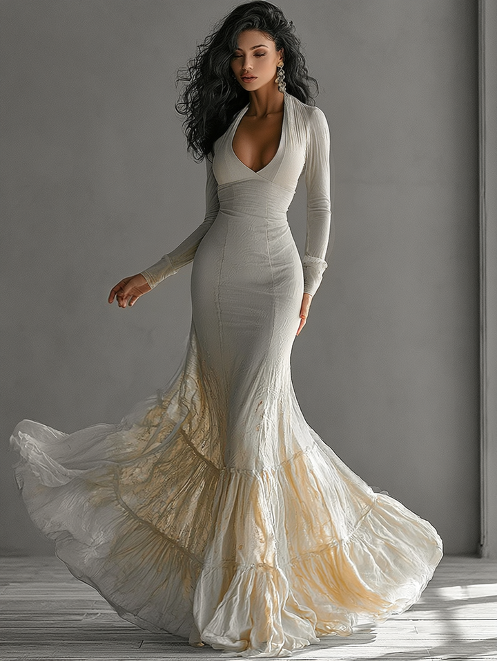 Elegant women's beige deep V-neck mermaid maxi dress with ruffle hem, perfect for formal evening events & black tie.