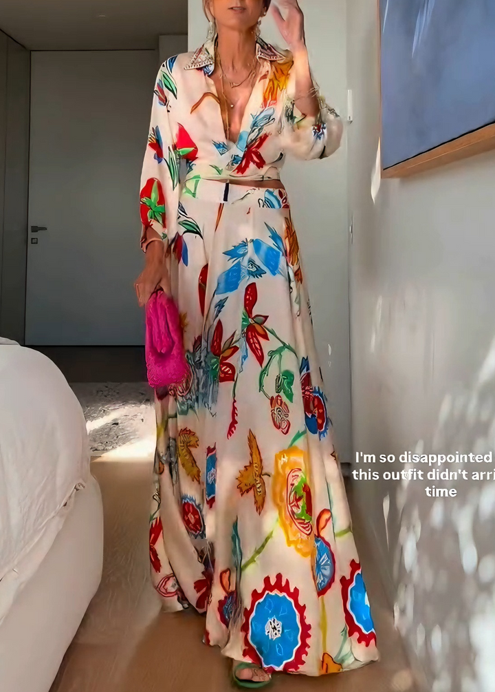 Floral print long-sleeve tie-front top and high-waist maxi skirt set for women. Chic bohemian summer outfit.