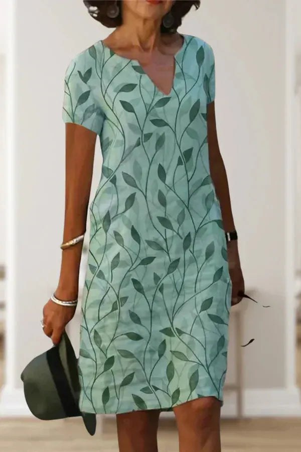 Elegant women's belted midi dress, perfect for sophisticated style & occasion wear. Feminine & versatile fashion.