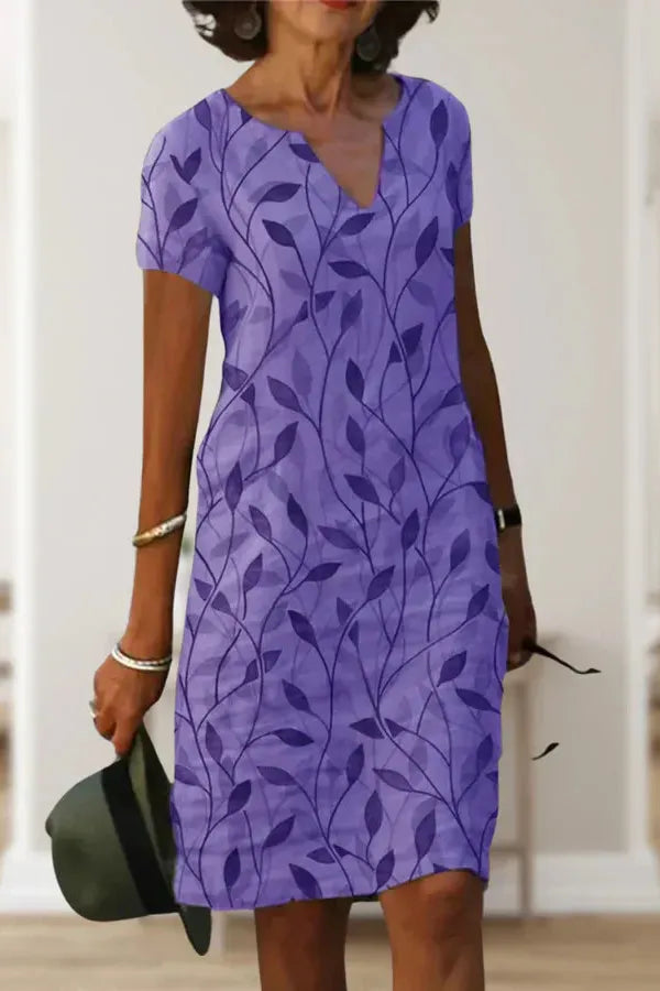 Versatile women's midi dress with an elegant belt, suitable for sophisticated parties or daily wear.