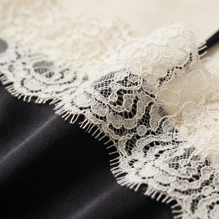 Stylish women's beige camisole with intricate lace trim, a comfortable regular fit sleeveless top.