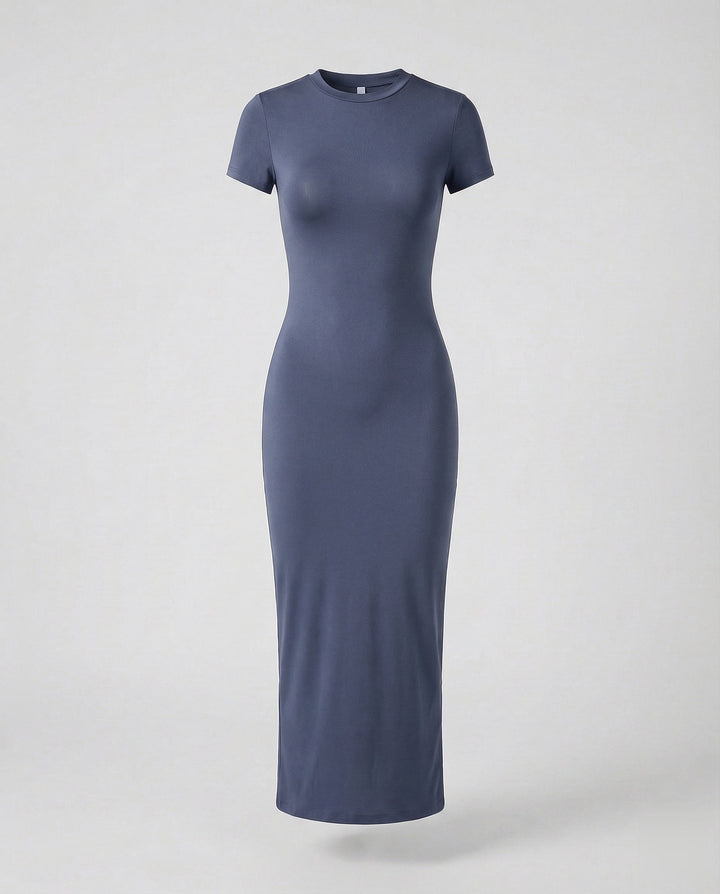 Detail of the maxi length hem on a women's elegant crew neck short sleeve bodycon dress, a summer fashion essential.
